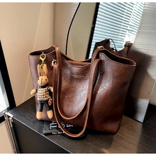 Emma Rustic Edge Tote – Spacious Vintage Vegan Leather Bag with Fancy Pendant