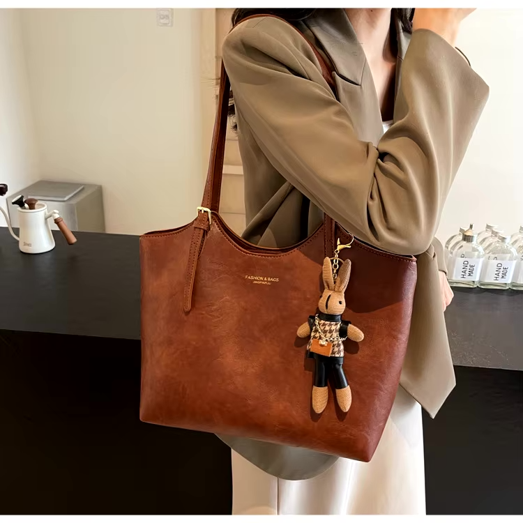 Emma Rustic Edge Tote – Spacious Vintage Vegan Leather Bag with Fancy Pendant