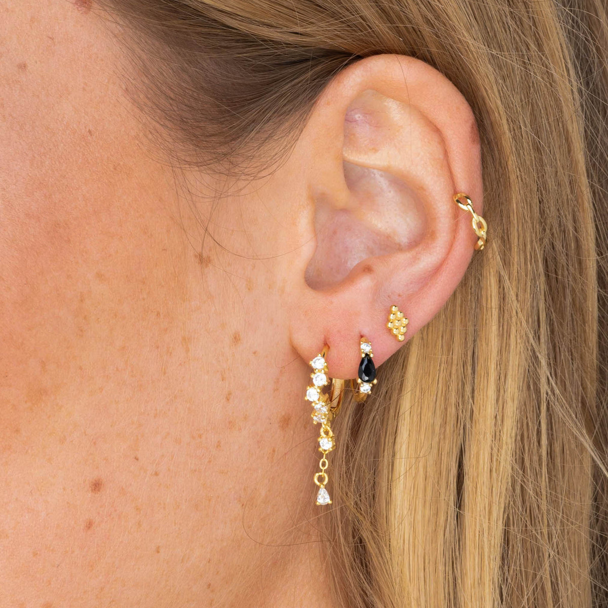 Black Teardrop Sapphire Huggie Earrings