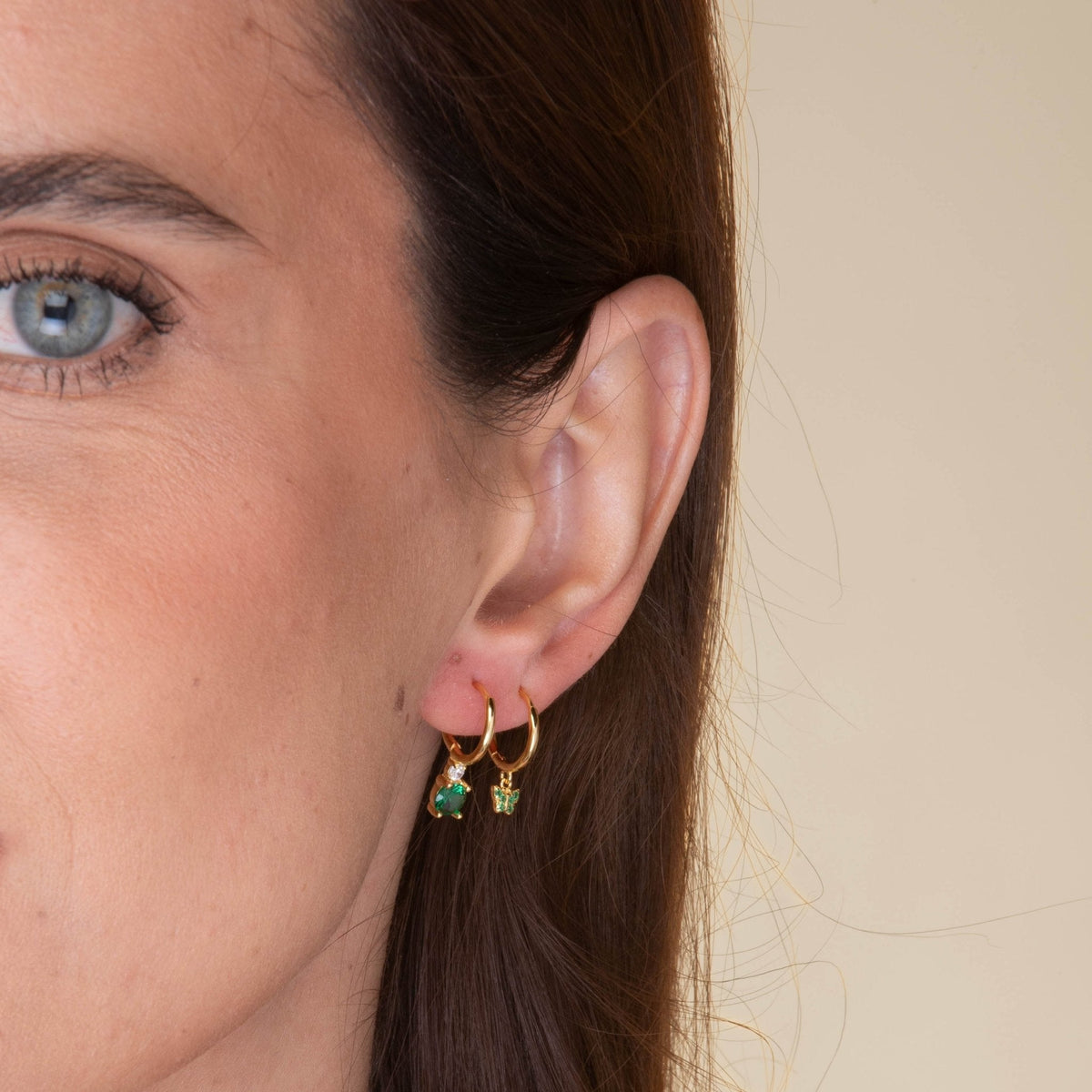 Double Emerald Solitaire Huggie Earrings