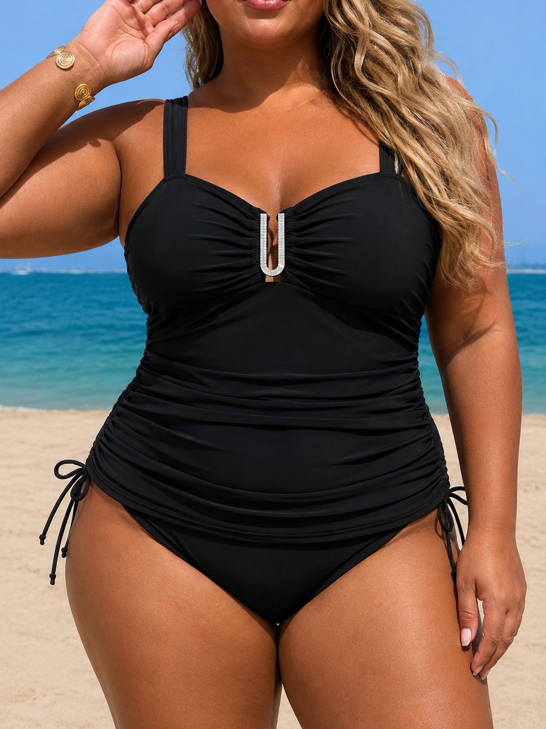 Black adjustable-side tankini set featuring a sweetheart neckline, supportive straps, and refined front detail.