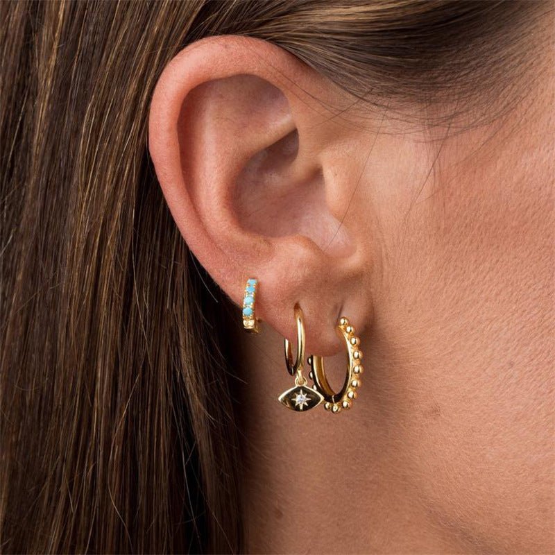 Evil Eye Sapphire Huggie Earrings