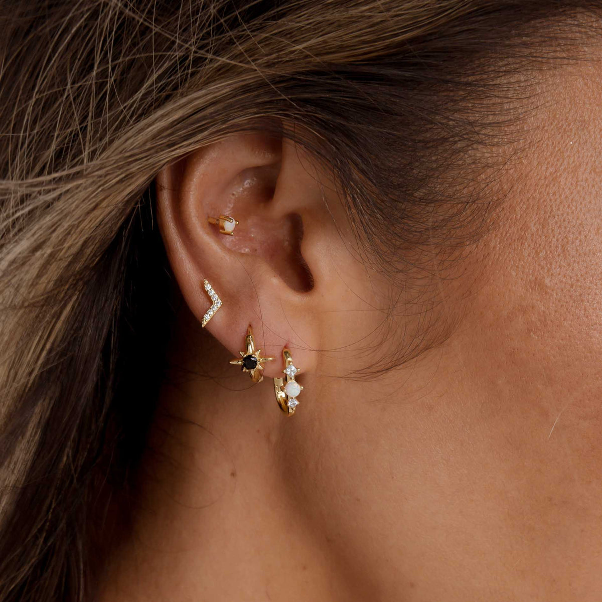 North Star Black Huggie Earrings